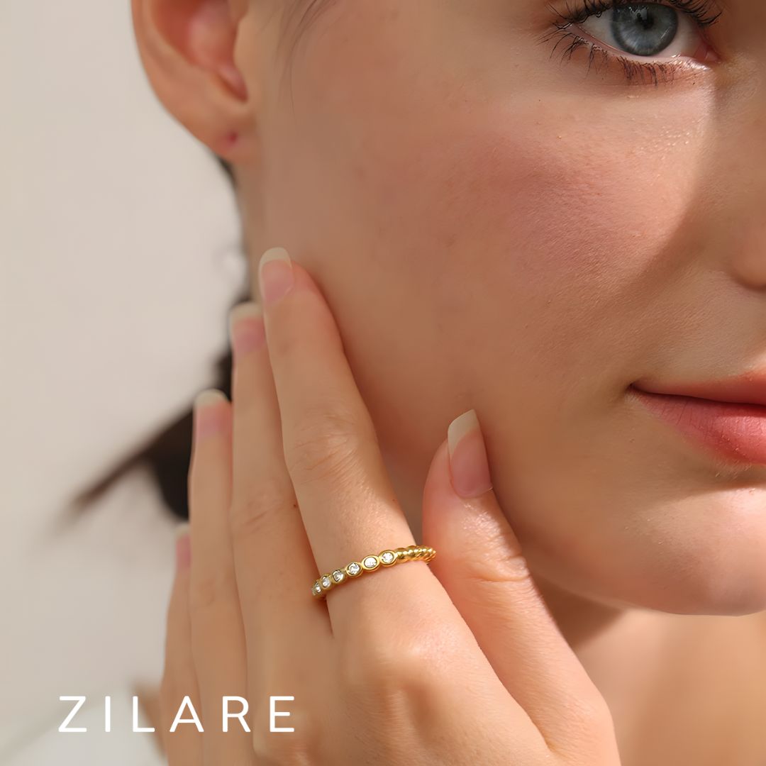 Anillo dorado con zirconias ajustable bañado oro 18k Laura