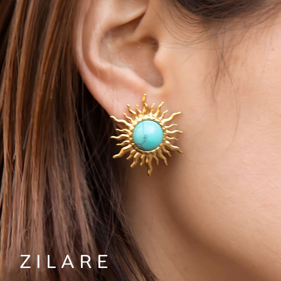 Aretes dorados bañados oro 18k diseño de sol turquesa Xidani