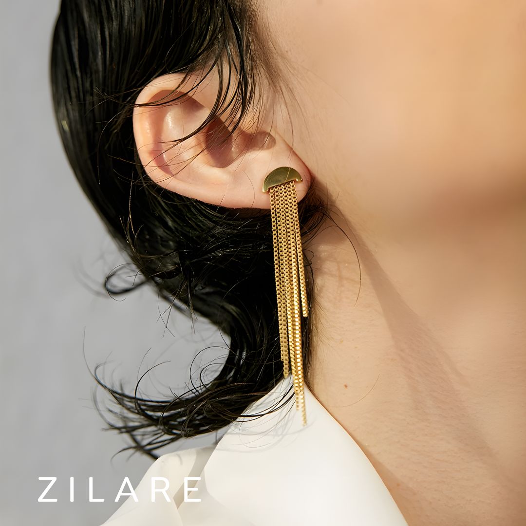 Aretes dorados bañados oro 18k sofisticados y llamativos Luz