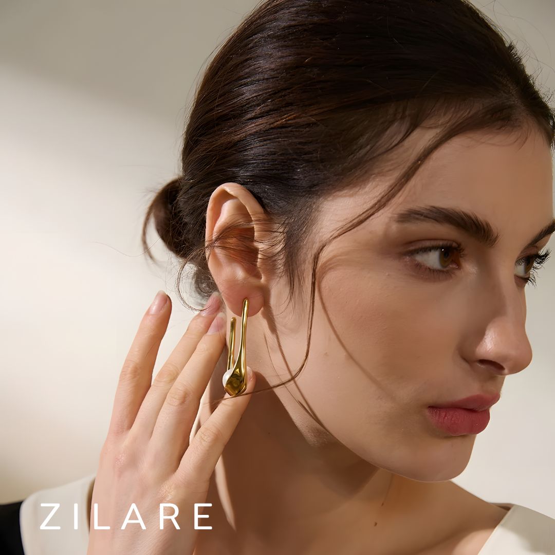 Aretes dorados bañados en oro 18k elegante con piedra Julia