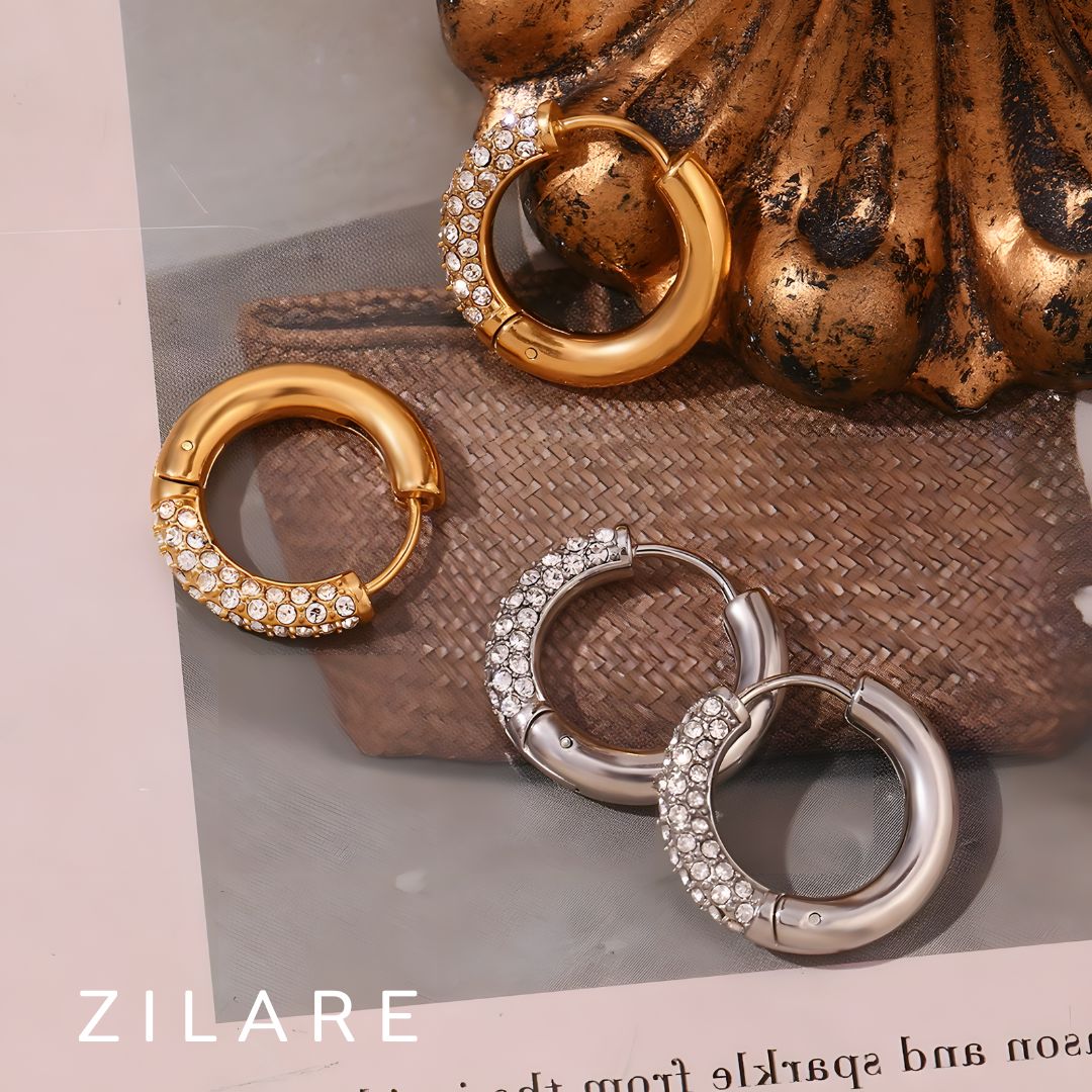 Aretes delicados baño de oro 18k con diseño brillante Marely