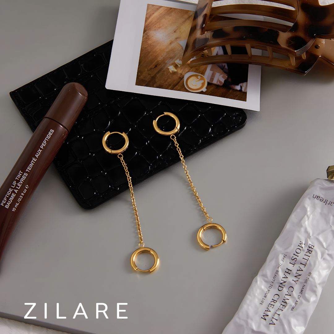 Aretes dorados con cadena elegantes bañado en oro 18k Amaris