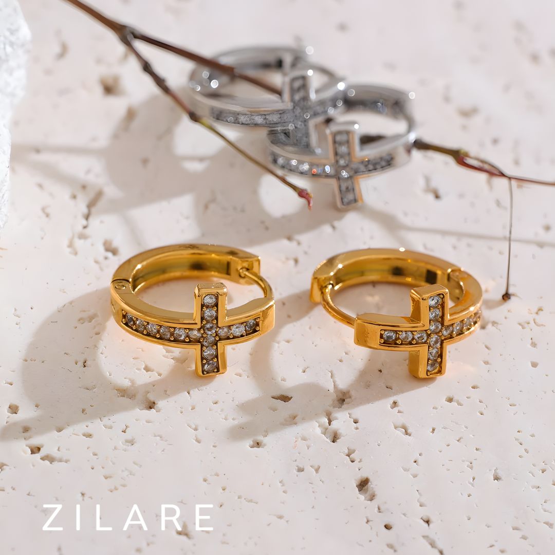 Aretes dorados con cruz y zirconias bañados en oro 18k Lía