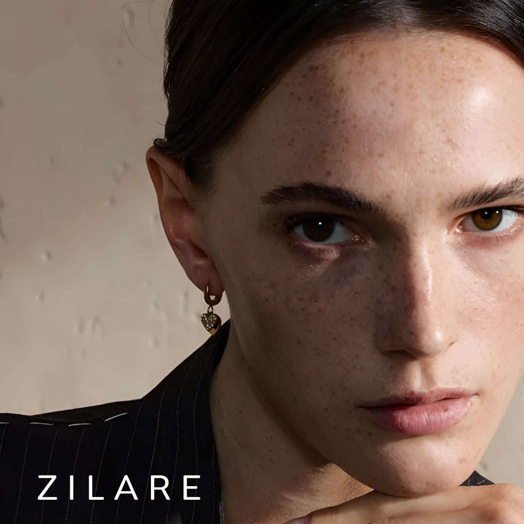 Aretes dorados elegantes con corazón bañados oro 18k Reina