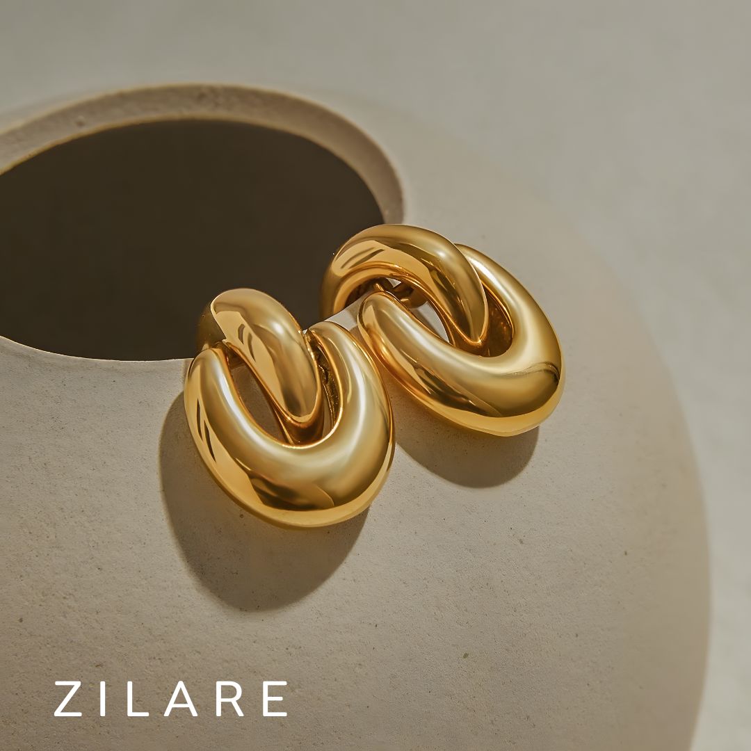 Aretes dorados sofisticado gruesos bañados en oro 18k Flavya