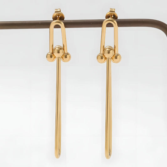 Aretes dorados largos elegantes bañados en oro 18k Adelina