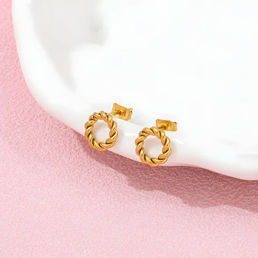Aretes circulares dorados trenzados baño de oro 18k Mariela