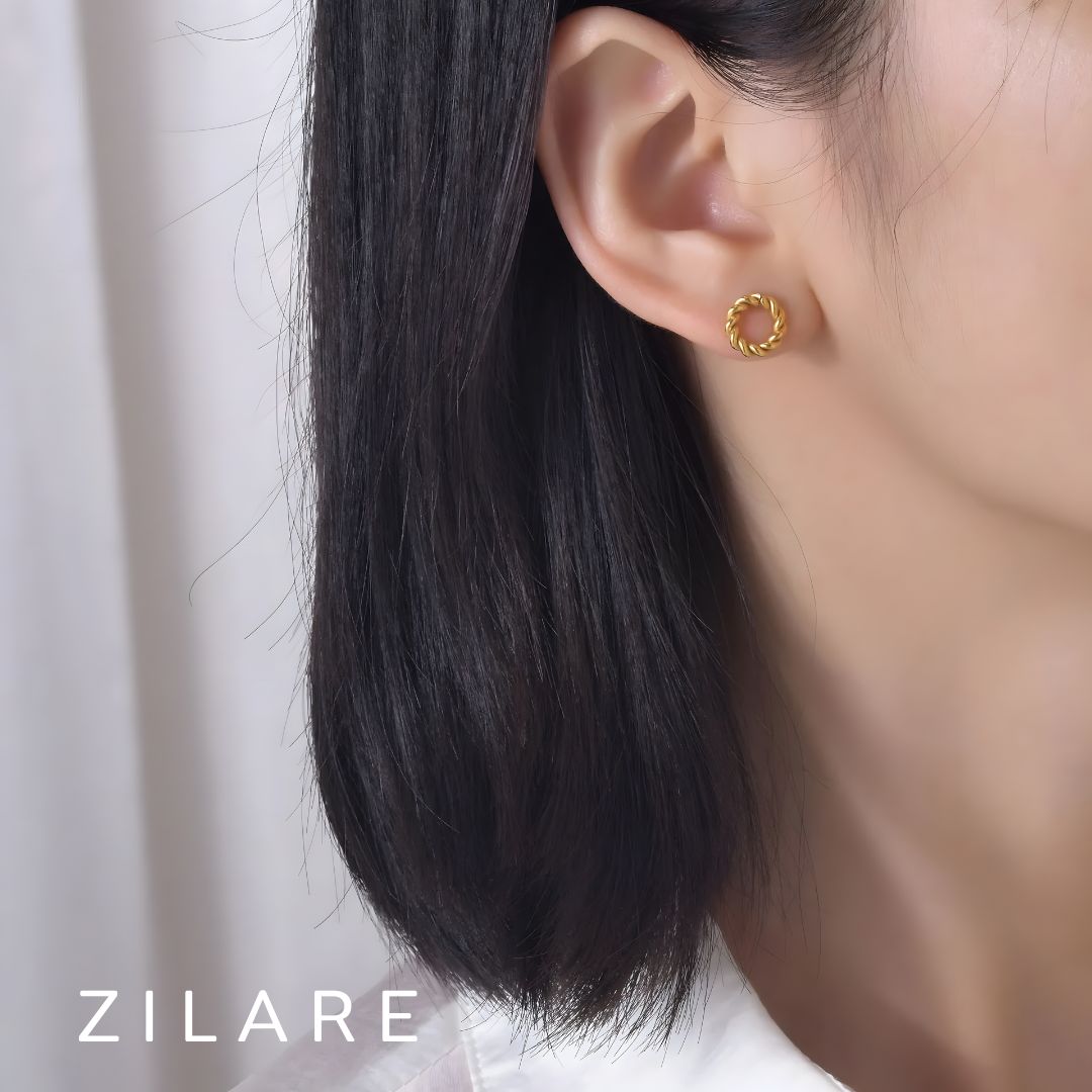 Aretes circulares dorados trenzados baño de oro 18k Mariela