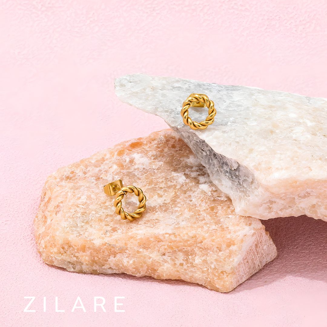 Aretes circulares dorados trenzados baño de oro 18k Mariela