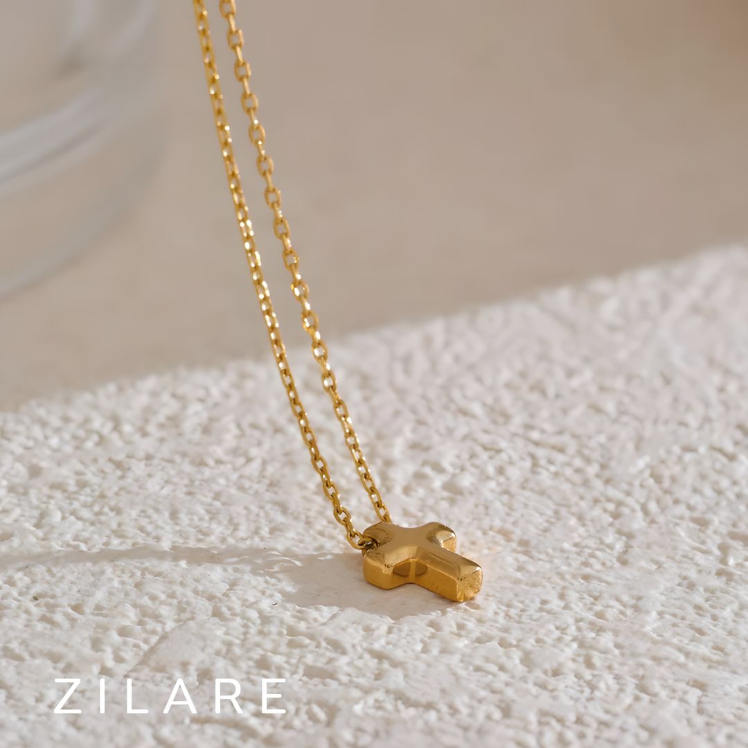 Collar dorado bañado en oro 18k con cruz elegante Selini