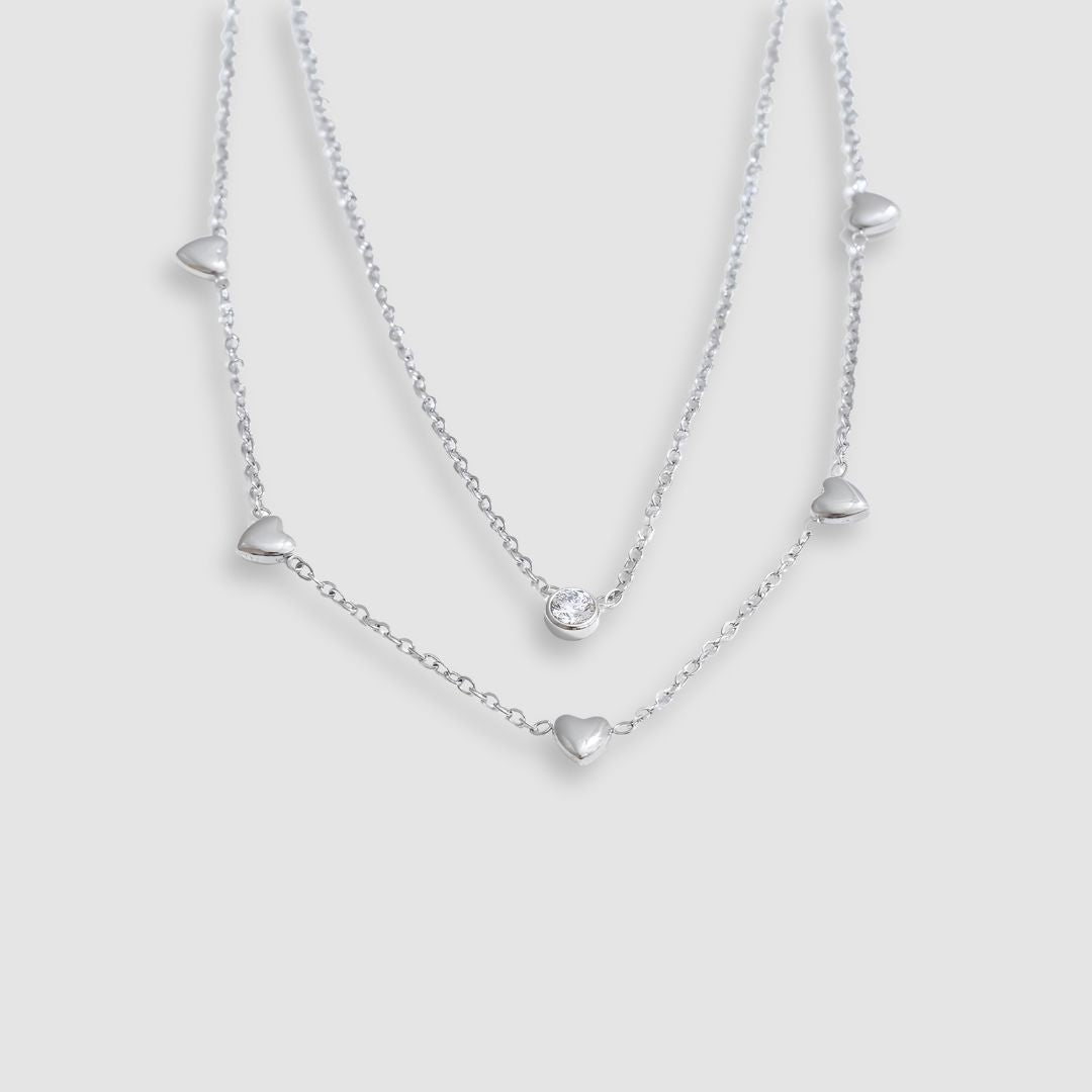 Collar doble con corazones y brillante bañado en oro 18k Isis