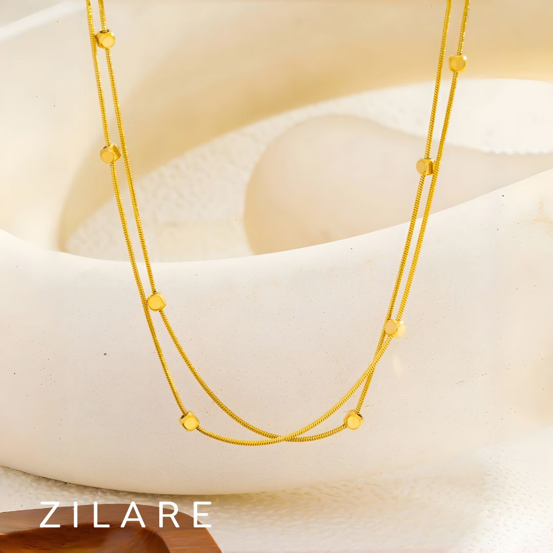 Collar dorado chic baño de oro 18k doble y moderno Adhara