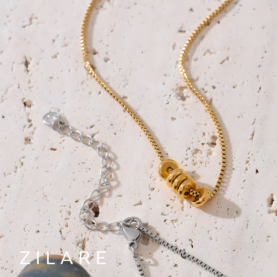 Collar dorado bañado en oro 18k con delicadas argollas Vera