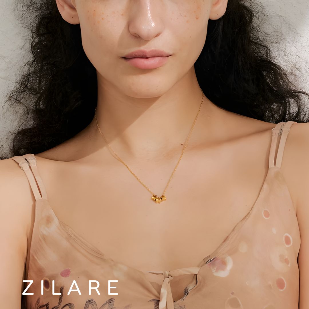 Collar bañado en oro 18k con diseño elegante de estrellas Cleo