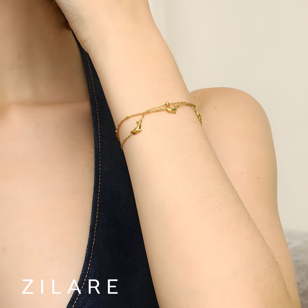 Pulsera dorada doble con delfines baño de oro 18k Paloma