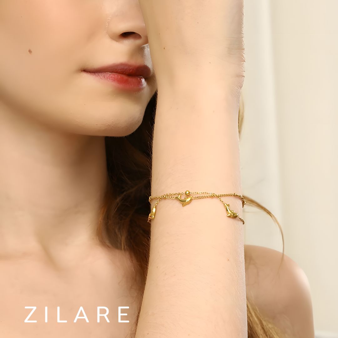 Pulsera dorada doble con delfines baño de oro 18k Paloma
