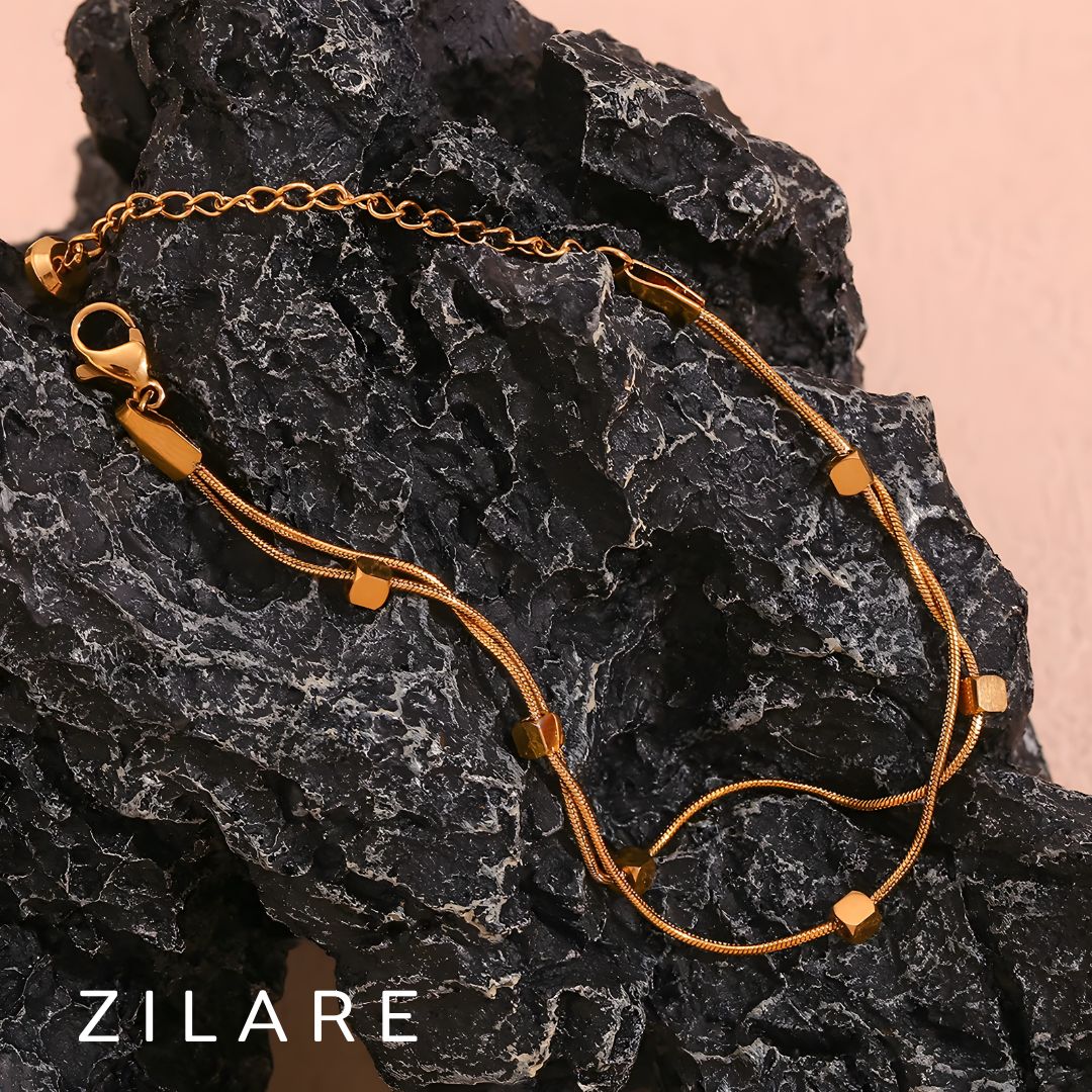 Pulsera dorada doble elegante con baño de oro 18k Leira