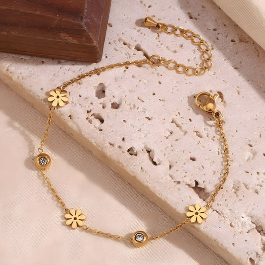 Pulsera de flores dorada delicada con baño de oro 18k Aranza