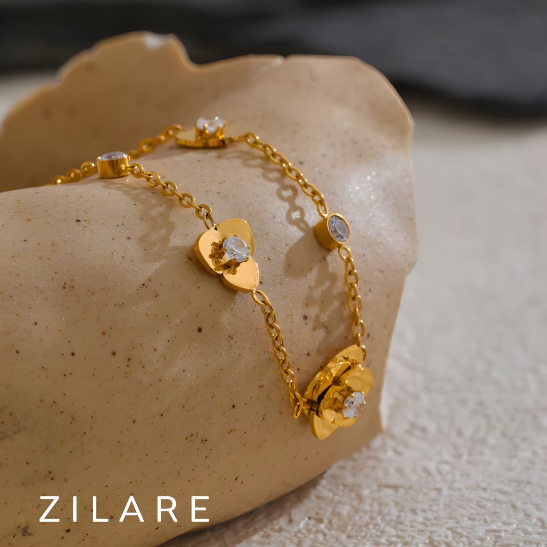 Pulsera dorada con flor y brillo bañado en oro 18k Eliana