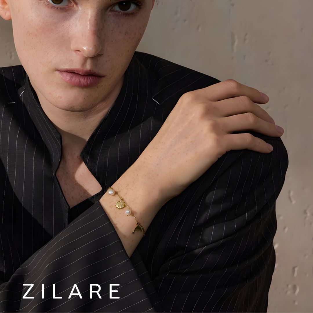 Pulsera dorada marina con dijes bañada en oro 18k Isadora