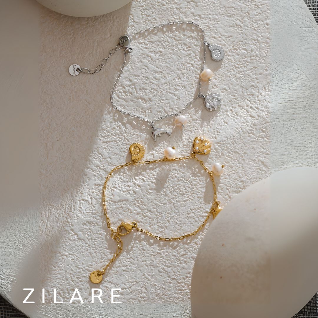 Pulsera dorada marina con dijes bañada en oro 18k Isadora