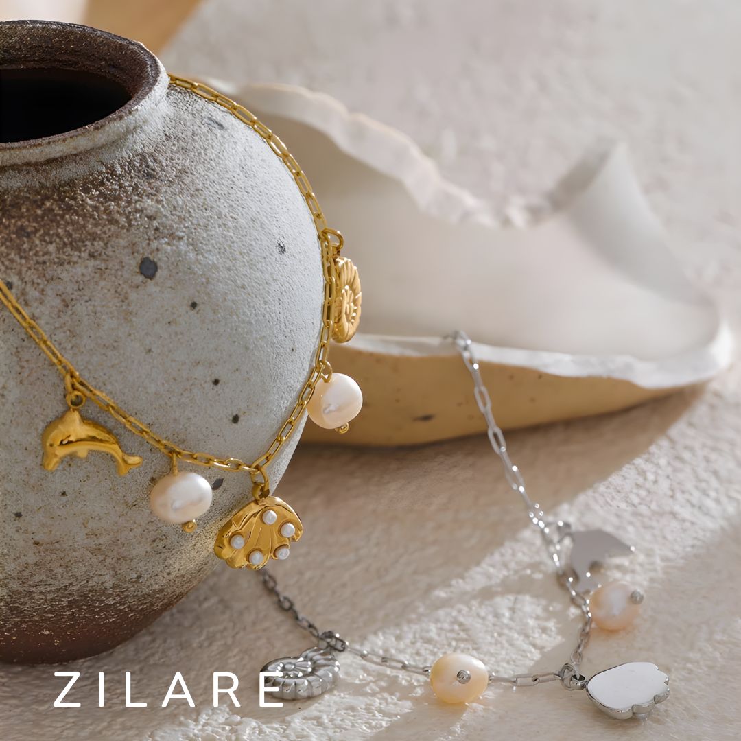 Pulsera dorada marina con dijes bañada en oro 18k Isadora