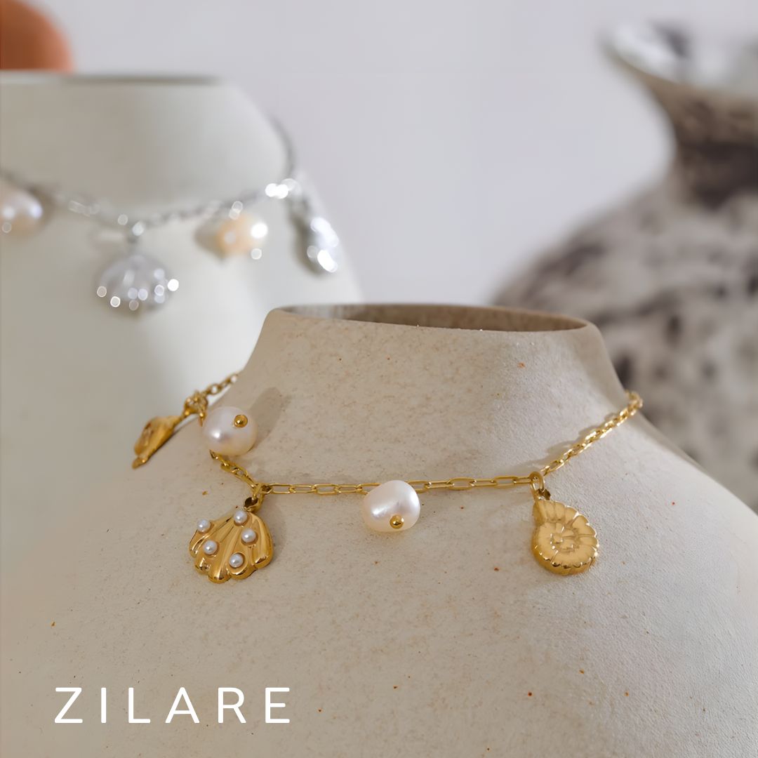 Pulsera dorada marina con dijes bañada en oro 18k Isadora