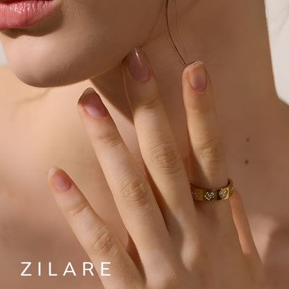 Anillo bañado en oro 18k con corazones y circonias Fabiola