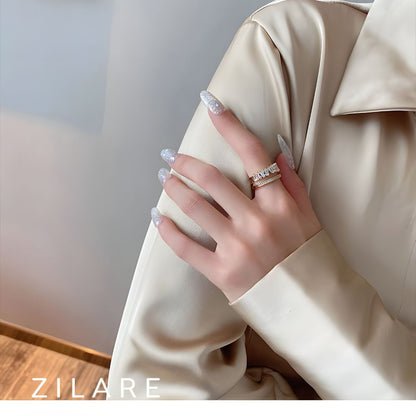 Anillo con Brillantes en Diseño Abierto Bañado en Oro Noa