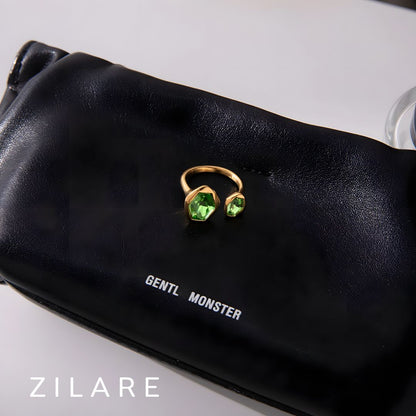 Anillo dorado baño de oro 18k con piedra verde  Naydelin