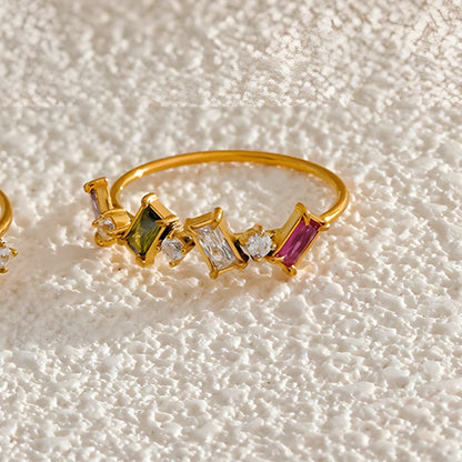 Anillo dorado moderno piedras de colores bañado oro 18k Lara