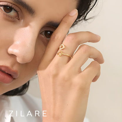 Anillo dorado ajustable con corazones y circonias Eliette