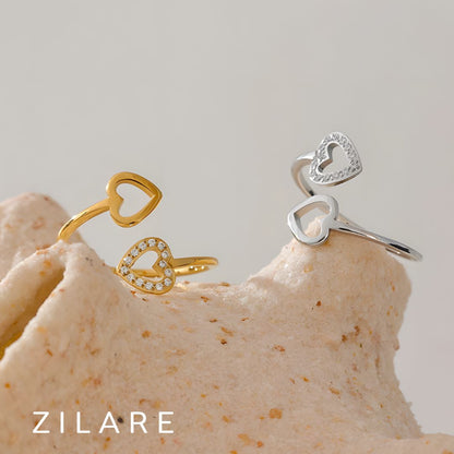 Anillo dorado ajustable con corazones y circonias Eliette