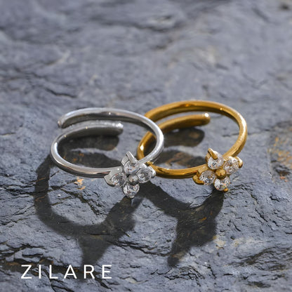 Anillo dorado con flor brillante bañado en oro 18k Danna