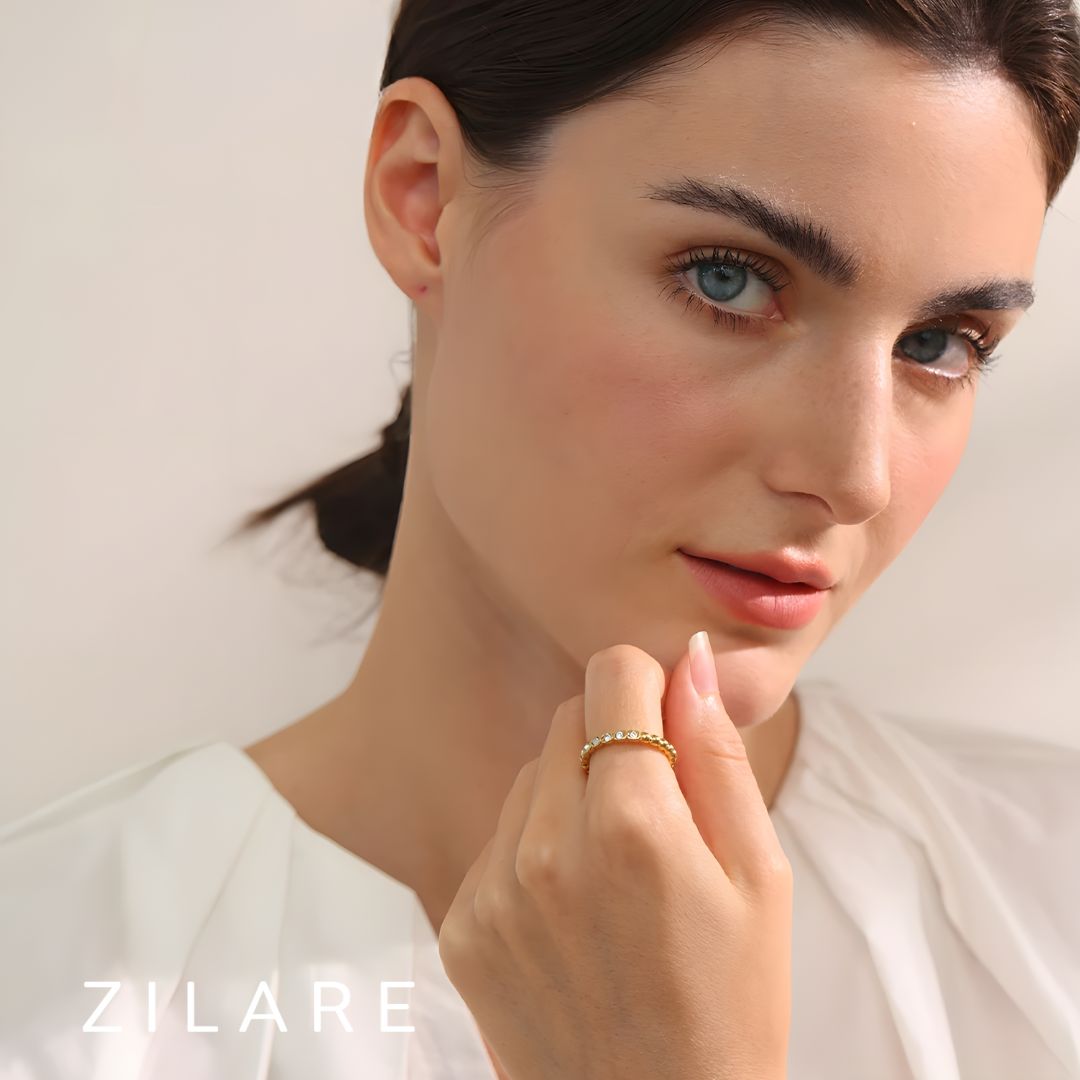 Anillo dorado con zirconias ajustable bañado oro 18k Laura