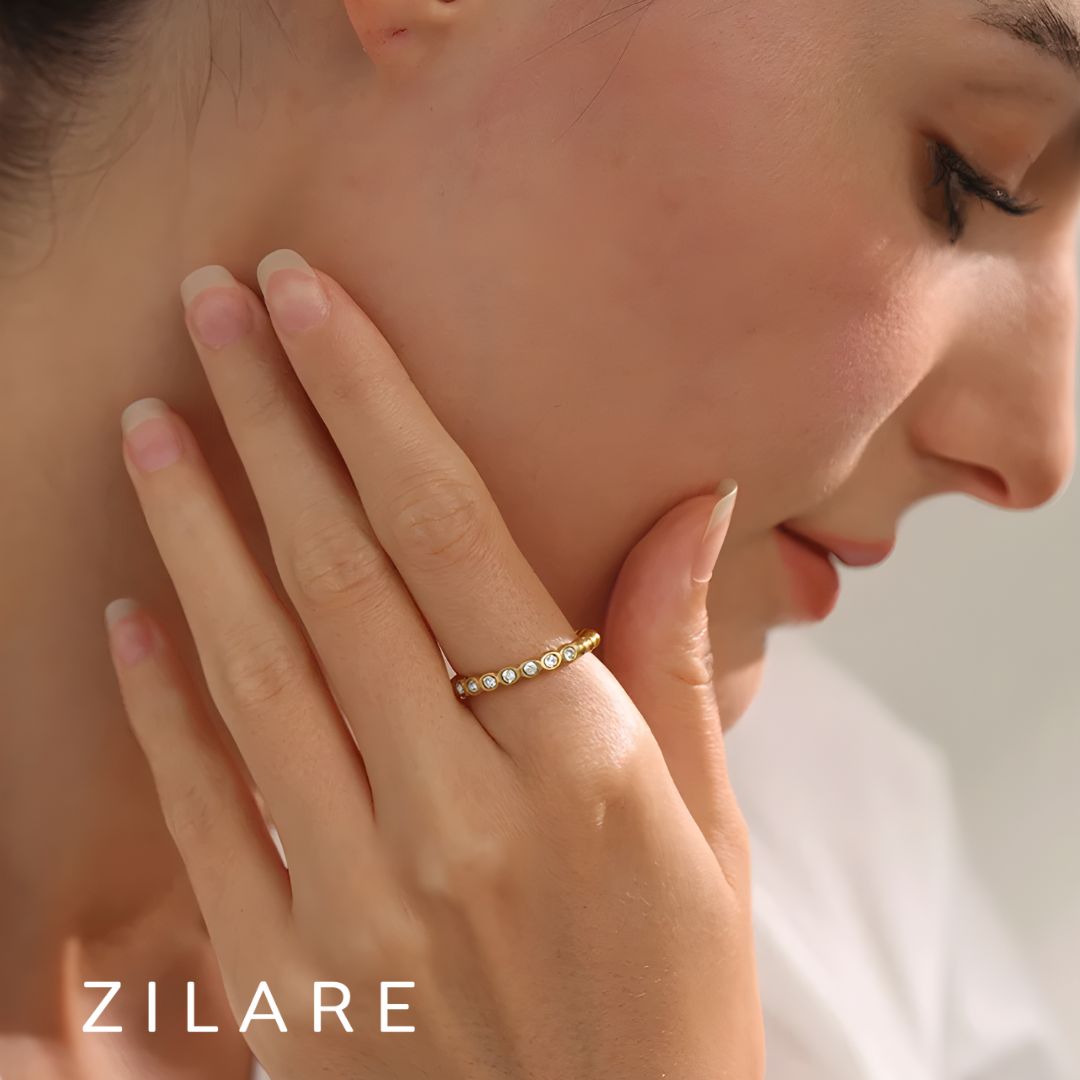 Anillo dorado con zirconias ajustable bañado oro 18k Laura