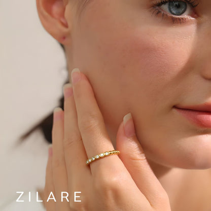 Anillo dorado con zirconias ajustable bañado oro 18k Laura