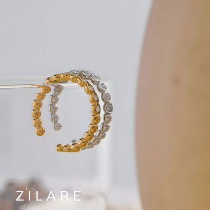 Anillo dorado con zirconias ajustable bañado oro 18k Laura