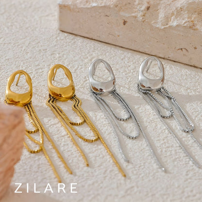 Arete dorado elegante con cadenas largas bañado oro 18k Lucí