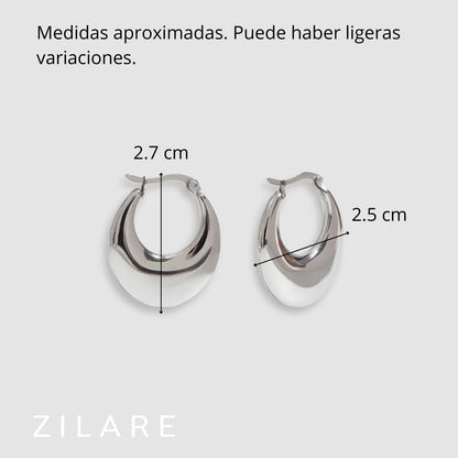 Aretes delicados acero inoxidable con diseño curvo Yamileth