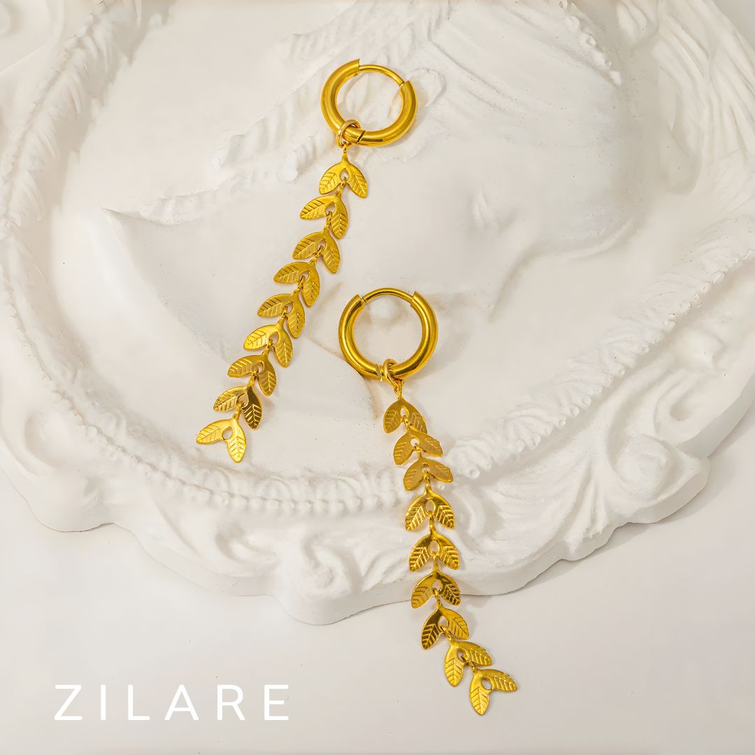 Aretes colgantes dorados con hojas baño de oro 18k Dalía