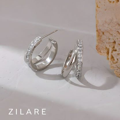 Aretes dorados tipo argolla doble bañados en oro 18k Luzia