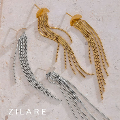 Aretes dorados bañados oro 18k sofisticados y llamativos Luz