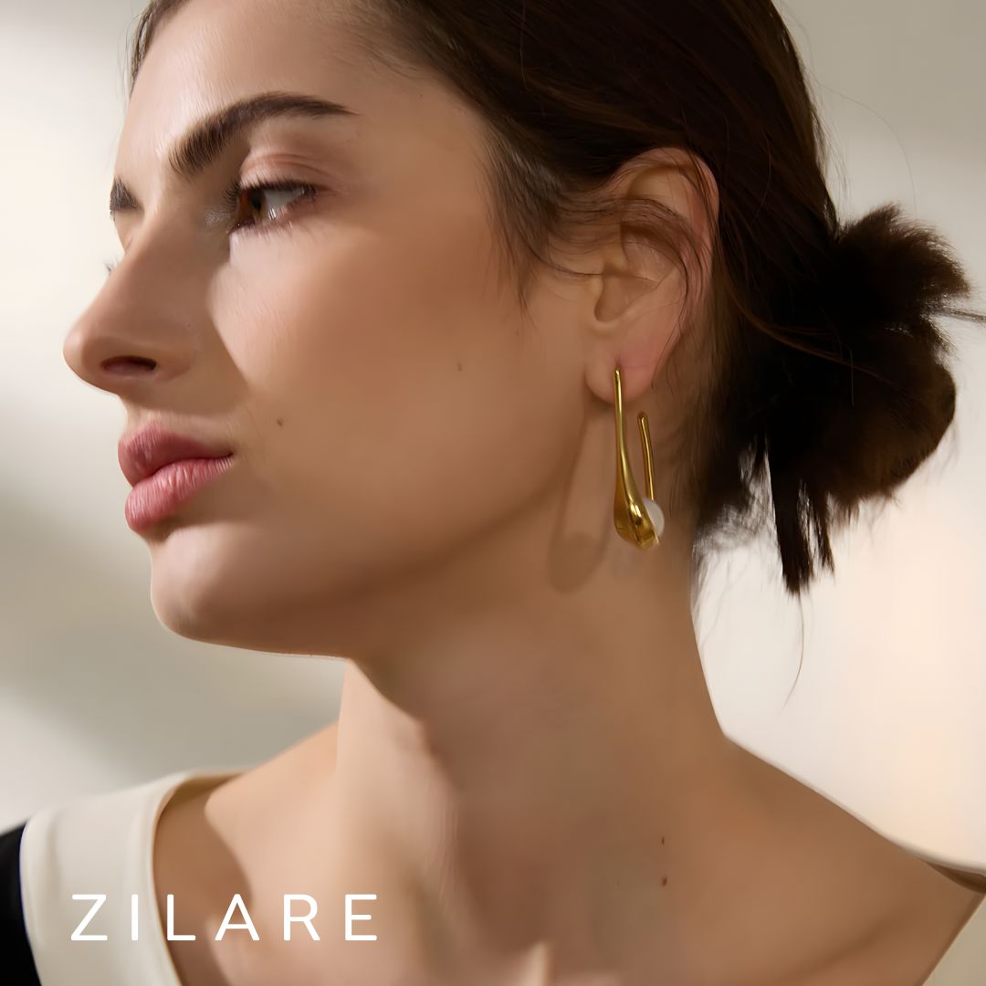 Aretes dorados bañados en oro 18k elegante con piedra Julia