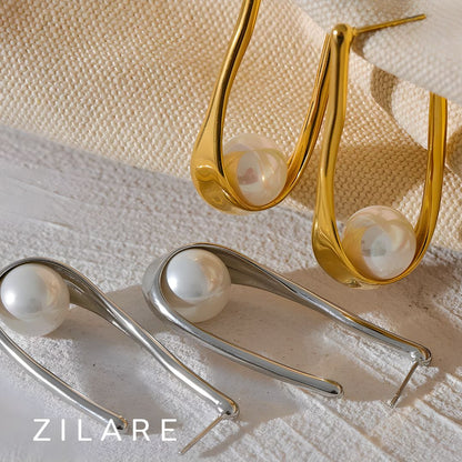 Aretes dorados bañados en oro 18k elegante con piedra Julia