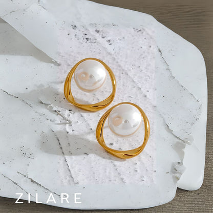 Aretes dorados bañados  oro 18k elegantes y únicos Gabriela