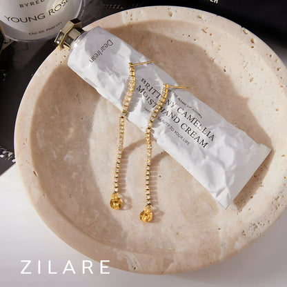 Aretes dorados con brillo elegante bañado en oro 18k Yuridia