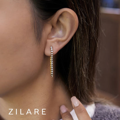 Aretes dorados con brillo elegante bañado en oro 18k Yuridia