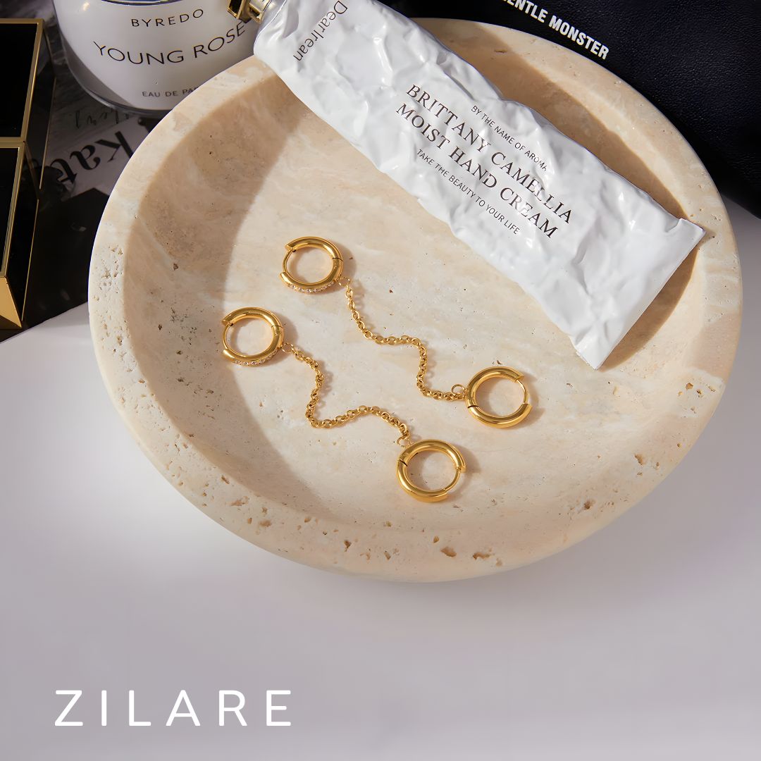 Aretes dorados con cadena elegantes bañado en oro 18k Amaris