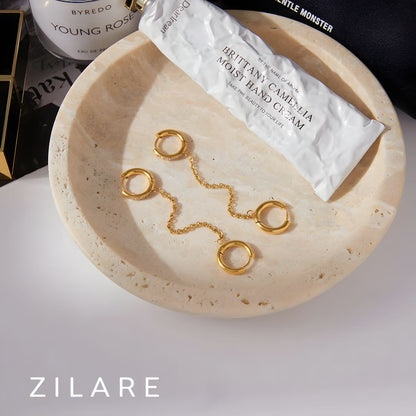 Aretes dorados con cadena elegantes bañado en oro 18k Amaris